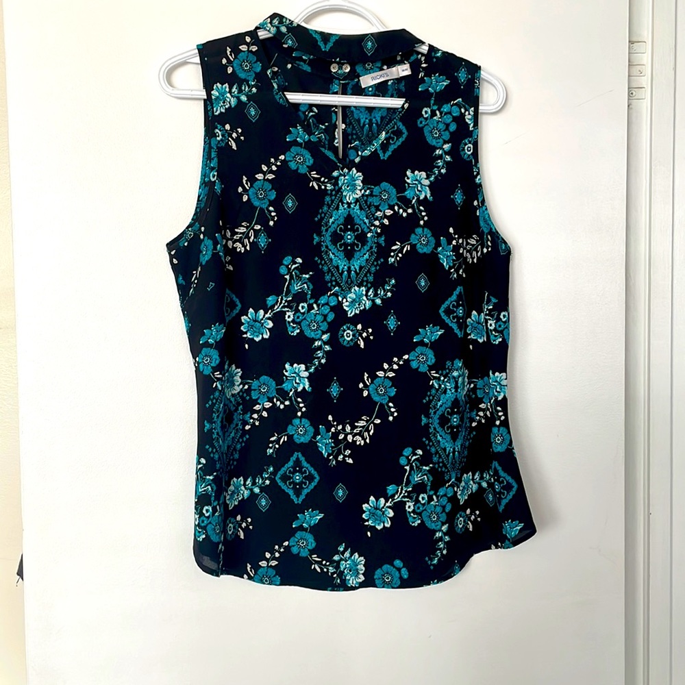 Ricki’s, Sleeveless business casual top.